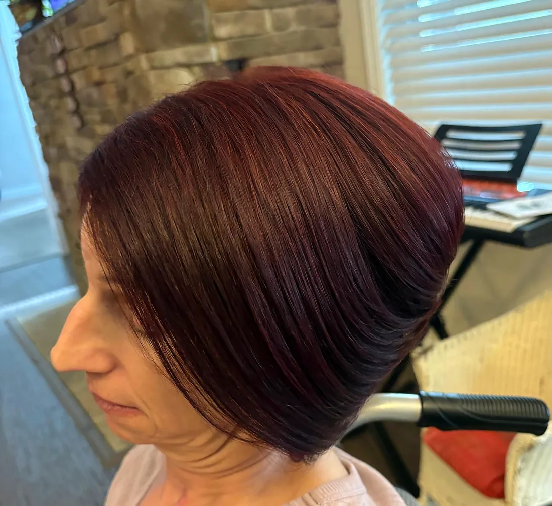 After — sleek red bob